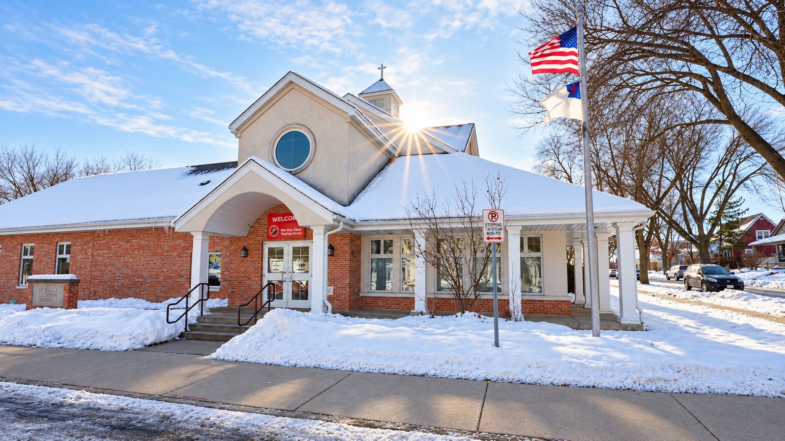Church building in winter with the sun breaking over the roof, filmed for a church video in Wisconsin