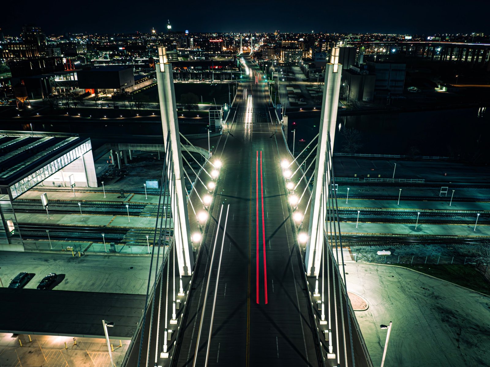 Night aerial of the Sixth Street Viaduct in Milwaukee with light trails, by Bokeh Film Production