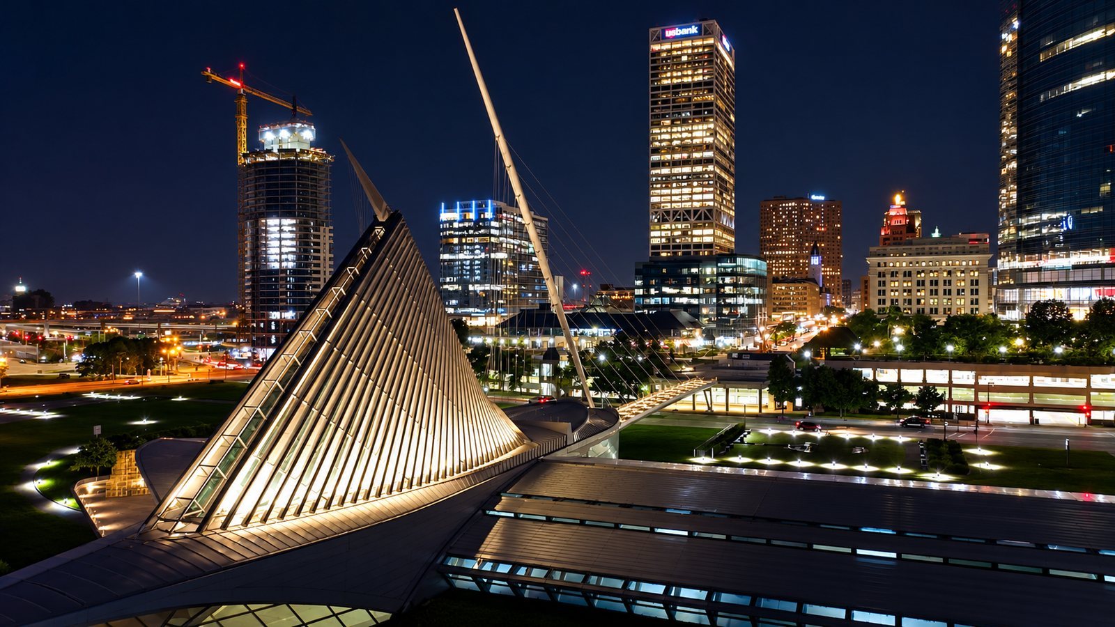 Milwaukee Art Museum and lakefront at night from the air