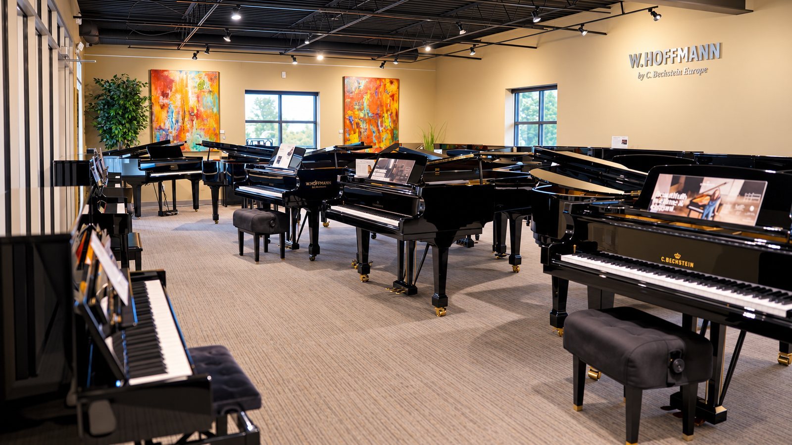 Piano showroom filled with grand pianos in warm natural light, filmed for a retail brand video
