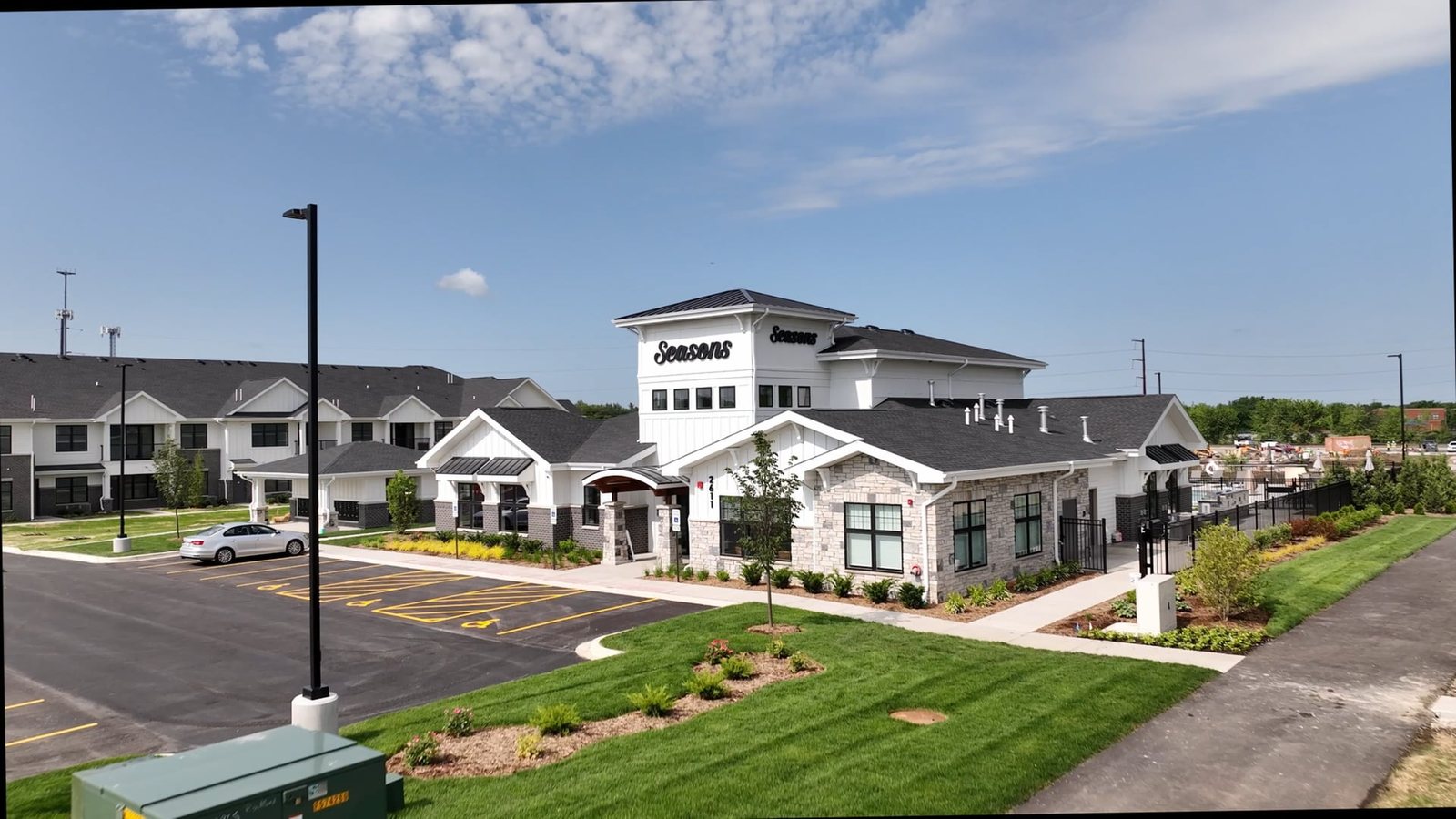 Aerial of a newly built apartment community in Elgin, Illinois, from a construction progress film by Bokeh Film Production